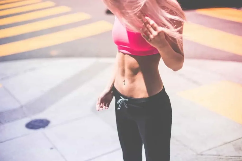 Woman with toned stomach after LA-EMS Body Sculpting Treatment Bracknell